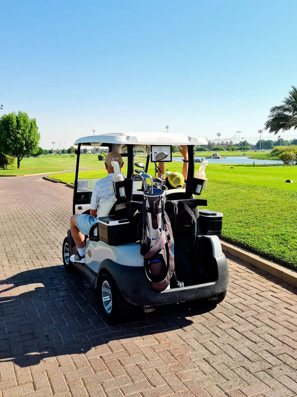 Heading out around the golf course in a buggy on a family afternoon